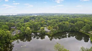 Aerial Image of the Private Lake and Amesbury Townhomes on Regents Walk Shorewood, Minnesota 55331